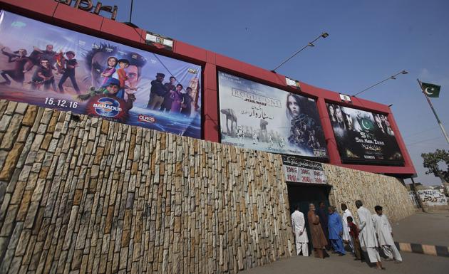 Billboards of a local cinema display films in Karachi on Sunday. Freaky Ali, a romantic comedy starring Nawazuddin Siddiqui, Arbaaz Khan and Amy Jackson, which was released in September in India, is the first film being screened since the lifting of the self-imposed suspension. (AP) Billboards of a local cinema display films in Karachi on Sunday. Freaky Ali, a romantic comedy starring Nawazuddin Siddiqui, Arbaaz Khan and Amy Jackson, which was released in September in India, is the first film being screened since the lifting of the self-imposed suspension. (AP)