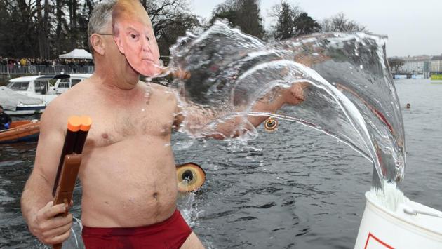 A participant with a Donald Trump mask poses before jumping into Lake Geneva. (Martial Trezzini/AP) A participant with a Donald Trump mask poses before jumping into Lake Geneva. (Martial Trezzini/AP)
