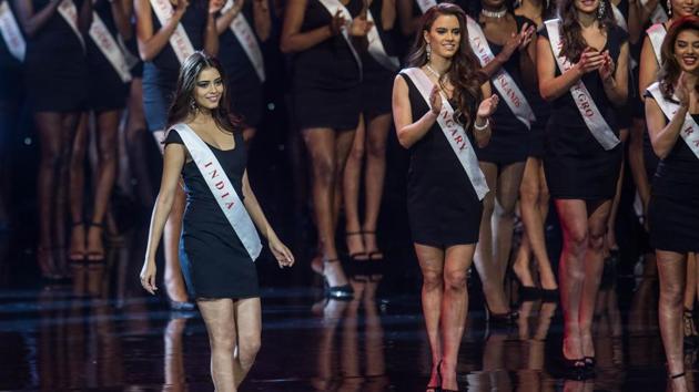 Miss India Priyadarshina Chatterjee walks the stage at the grand final of the Miss World 2016 pageant. Chatterjee lost out in the race after making it to the top 20. (Zach Gibson/AFP)
