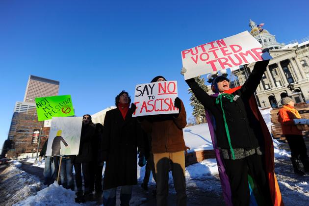A demonstration urging members of the Electoral College to vote against US president-elect Donald Trump on the eve of the vote on Sunday. (Agencies) A demonstration urging members of the Electoral College to vote against US president-elect Donald Trump on the eve of the vote on Sunday. (Agencies)