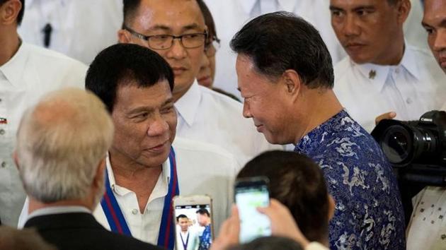 A file photo of Philippine President Rodrigo Duterte in talks with Chinese Ambassador to the Philippines Zhao Jianhua (R). (Reuters) A file photo of Philippine President Rodrigo Duterte in talks with Chinese Ambassador to the Philippines Zhao Jianhua (R). (Reuters)
