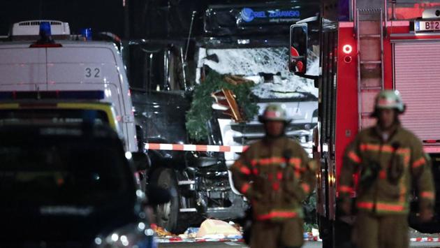 Parts of a Christmas market decoration stick in the windscreen of a truck following an accident with the truck on Breitscheidplatz square near the fashionable Kurfuerstendamm avenue in the west of Berlin, Germany on December 19. (REUTERS)