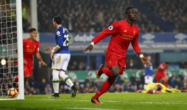 Sadio Mane of Liverpool celebrates after scoring the winning goal in injury time during the Premier League match between Everton and Liverpool at Goodison Park. (Getty Images) Sadio Mane of Liverpool celebrates after scoring the winning goal in injury time during the Premier League match between Everton and Liverpool at Goodison Park. (Getty Images)