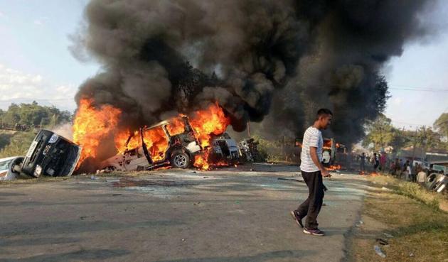 Vehicles are seen burning after being set alight by protesters in Imphal, Manipur. (AFP) Vehicles are seen burning after being set alight by protesters in Imphal, Manipur. (AFP)