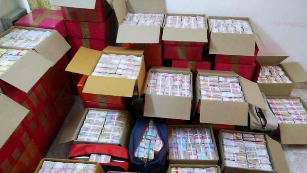 Huge cash seized by the Income Tax department after it conducted searches in Chennai. (PTI) Huge cash seized by the Income Tax department after it conducted searches in Chennai. (PTI)