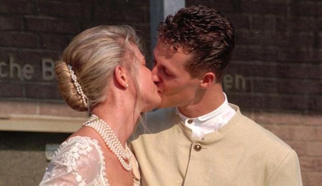 Formula one champion Michael Schumacher kisses his bride Corinna after their marriage on August 1, 1995 at Kerpen city hall. (File photo)(Associated Press) Formula one champion Michael Schumacher kisses his bride Corinna after their marriage on August 1, 1995 at Kerpen city hall. (File photo)(Associated Press)
