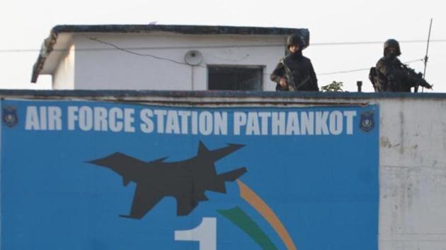 Commando stand guard at Airbase during search operation at Airbase after Completion of Terrorist combing operation in Pathankot On Tuesday.(HT File Photo)