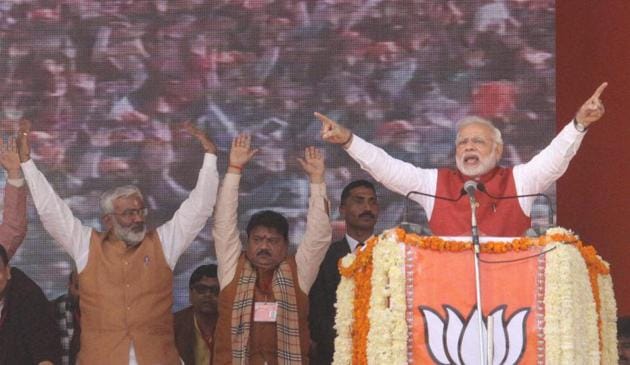 Prime Minister Narendra Modi addresses the BJP Parivartan Rally in Kanpur. Modi urged the Election Commission to pressure political parties to create transparency over the donations they get(PTI)