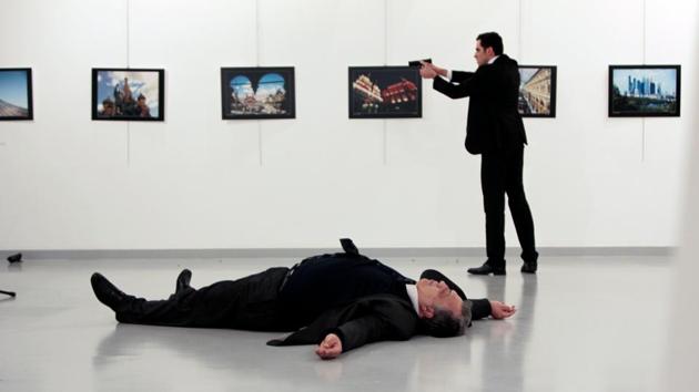 Russian ambassador to Turkey Andrei Karlov lies on the ground after he was shot by Mevlut Mert Altintas at an art gallery in Ankara, Turkey, on December 19, 2016. (Reuters) Russian ambassador to Turkey Andrei Karlov lies on the ground after he was shot by Mevlut Mert Altintas at an art gallery in Ankara, Turkey, on December 19, 2016. (Reuters)