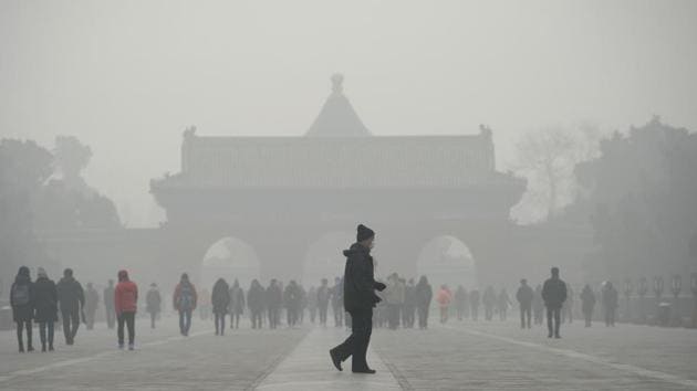 An elderly man in front of the Temple of Heaven park in Beijing, which is engulfed in heavy smog, on Tuesday. (AFP photo) An elderly man in front of the Temple of Heaven park in Beijing, which is engulfed in heavy smog, on Tuesday. (AFP photo)