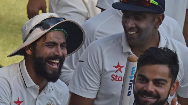 Ravindra Jadeja (from left), Ravichandran Ashwin and Virat Kohli after winning the fourth Test in Mumbai against England at Wankhede Stadium on December 12, 2016.(Pratham Gokhale/HT PHOTO)