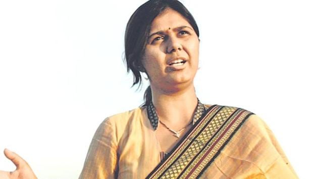 Maharashtra's women and child welfare minister Pankaja Munde was accused of flouting norms in awarding contracts for supplying items like ‘chikki’ (sweetmeat made with nuts and jaggery), mats, notebooks and water filters, among others, for schoolchildren.(HT file)