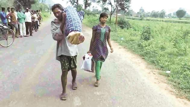 The Naveen Patnaik government faced embarrassing moments as the story of Dana Majhi, a poor tribal who had to walk over 10 km carrying his wife’s body on his shoulder from a government hospital in backward Kalahandi district after being denied a hearse in August, made international news. (Agency File Photo) The Naveen Patnaik government faced embarrassing moments as the story of Dana Majhi, a poor tribal who had to walk over 10 km carrying his wife’s body on his shoulder from a government hospital in backward Kalahandi district after being denied a hearse in August, made international news. (Agency File Photo)