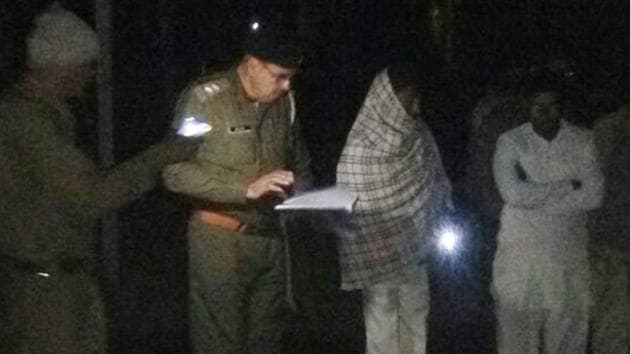 Police inspecting the spot where Dani Devi was crushed under a car in Haryana on Tuesday night. (HT Photo) Police inspecting the spot where Dani Devi was crushed under a car in Haryana on Tuesday night. (HT Photo)