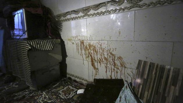 Blood stains are seen on the wall at a parliament member's house after a late night attack in western Kabul, Afghanistan, Thursday, Dec. 22, 2016. Afghan police say gunmen have stormed the home of a lawmaker Mir Wali in the capital, killing eight people and leaving the parliamentarian wounded after he jumped from a roof to escape. (AP Photo) Blood stains are seen on the wall at a parliament member's house after a late night attack in western Kabul, Afghanistan, Thursday, Dec. 22, 2016. Afghan police say gunmen have stormed the home of a lawmaker Mir Wali in the capital, killing eight people and leaving the parliamentarian wounded after he jumped from a roof to escape. (AP Photo)