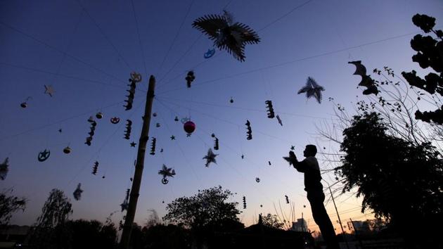 A man decorates his neighbourhood ahead of Christmas celebrations in Islamabad, Pakistan. (Reuters photo)