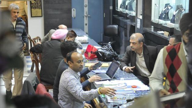 Income tax officials conducting a raid at Khanna Jewellers at College Road in Ludhiana on December 15, 2016.(Gurminder Singh/HT File Photo) Income tax officials conducting a raid at Khanna Jewellers at College Road in Ludhiana on December 15, 2016.(Gurminder Singh/HT File Photo)