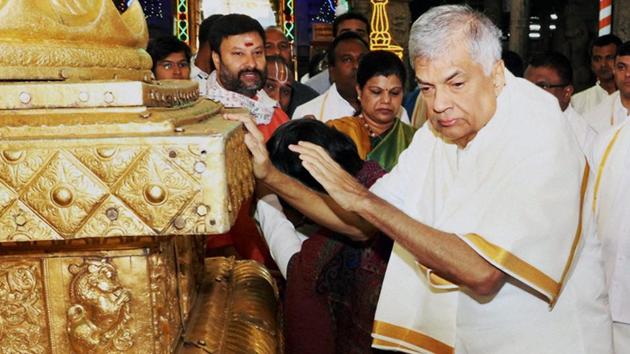 Sri Lankan Prime Minister Ranil Wickremesinghe offers prayers at Lord Venkateswara temple at Tirumala in Tirupati on Thursday. (PTI photo) Sri Lankan Prime Minister Ranil Wickremesinghe offers prayers at Lord Venkateswara temple at Tirumala in Tirupati on Thursday. (PTI photo)