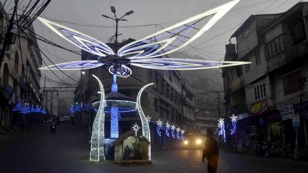 A pedestrian walks past a Christian nativity crib in Aizawl, Mizoram. (AFP photo)