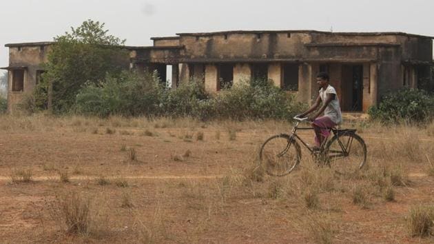 Bahragora (Jharkhand)(FILE PIX)A villager crossing through the dipalpitated non functioning health centre at village Rampur in Bahragora at West Singhbhum ( Photo by Parwaz Khan/ Hindustan Times) Story Saumya Mishra Bahragora (Jharkhand)(FILE PIX)A villager crossing through the dipalpitated non functioning health centre at village Rampur in Bahragora at West Singhbhum ( Photo by Parwaz Khan/ Hindustan Times) Story Saumya Mishra