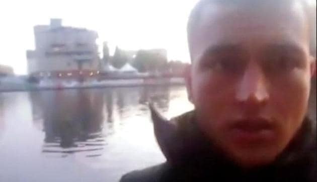 A still image taken from a short 'selfie' video clip from a social media website purportedly shows Anis Amri, the Tunisian suspect of the Berlin Christmas market attack, at an unknown location.(Social Media/via Reuters TV) A still image taken from a short 'selfie' video clip from a social media website purportedly shows Anis Amri, the Tunisian suspect of the Berlin Christmas market attack, at an unknown location.(Social Media/via Reuters TV)