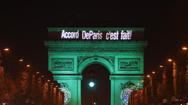 The Arc de Triomphe (Arch of Triumph) illuminated with the letters reading 'The Paris accord is done' to celebrate the first day of the application of the Paris COP21 climate accord in November.(AFP file photo) The Arc de Triomphe (Arch of Triumph) illuminated with the letters reading 'The Paris accord is done' to celebrate the first day of the application of the Paris COP21 climate accord in November.(AFP file photo)