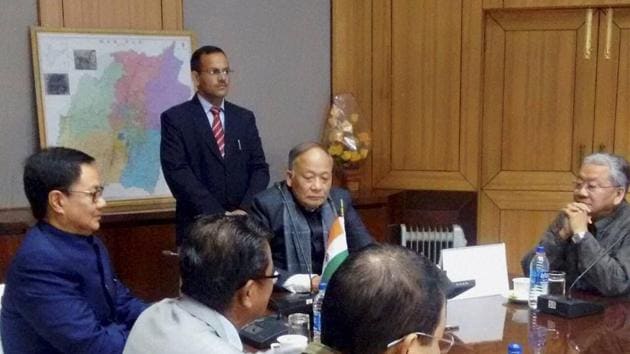 Minister of state for home Kiren Rijiju in a meeting with Manipur chief minister Okram Ibobi Singh in Imphal on Friday.(PTI Photo) Minister of state for home Kiren Rijiju in a meeting with Manipur chief minister Okram Ibobi Singh in Imphal on Friday.(PTI Photo)