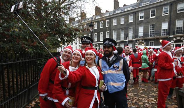 Santas take part in the Santacon event, London, December 10 (Reuters) Santas take part in the Santacon event, London, December 10 (Reuters)