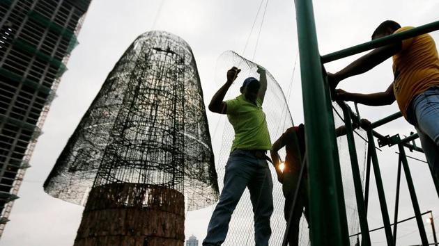 Sri Lanka surpassed the world record for the tallest artificial Christmas tree on Saturday after the initiative by cricket legend Arjuna Ranatunga received the blessings on Archbishop of Colombo Malcolm Ranjith. (REUTERS) Sri Lanka surpassed the world record for the tallest artificial Christmas tree on Saturday after the initiative by cricket legend Arjuna Ranatunga received the blessings on Archbishop of Colombo Malcolm Ranjith. (REUTERS)