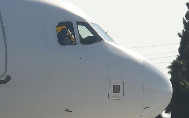 A hijacked Libyan Afriqiyah Airways Airbus A320 stands on the runway at Malta Airport. (REUTERS)