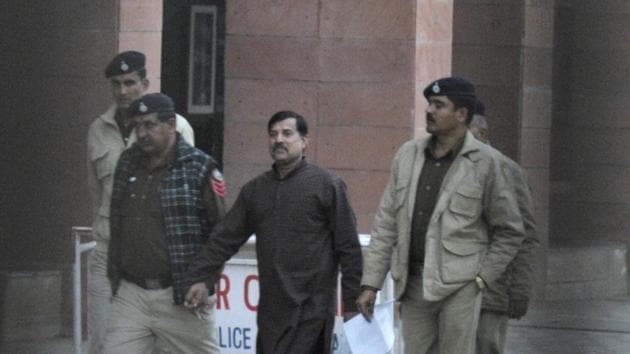 Police take Zulfiqar Khan out of the district courts complex in Sector 43 in Chandigarh on Friday.(Ravi Kumar/HT Photo) Police take Zulfiqar Khan out of the district courts complex in Sector 43 in Chandigarh on Friday.(Ravi Kumar/HT Photo)