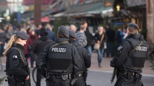 Armed police patrol at the Christmas market outside the Centro, one of Germany's largest shopping and leisure centers, in Oberhausen, western Germany.(AFP Photo) Armed police patrol at the Christmas market outside the Centro, one of Germany's largest shopping and leisure centers, in Oberhausen, western Germany.(AFP Photo)