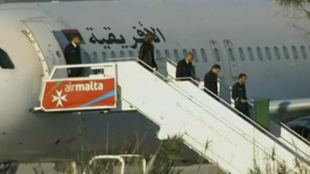 An Afriqiyah Airways plane stands on the tarmac at Malta International airport as people depart, Friday, Dec. 23, 2016. (AP) An Afriqiyah Airways plane stands on the tarmac at Malta International airport as people depart, Friday, Dec. 23, 2016. (AP)