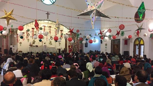 People pray on Christmas Day at Epiphany Church in Gurgaon. (Parveen Kumar/HT Photo) People pray on Christmas Day at Epiphany Church in Gurgaon. (Parveen Kumar/HT Photo)