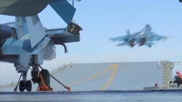 A still image taken from a video footage and released by Russia's Defence Ministry on November 15, 2016, shows a jet taking off from Russian Admiral Kuznetsov aircraft carrier near the coast of Syria.(Reuters) A still image taken from a video footage and released by Russia's Defence Ministry on November 15, 2016, shows a jet taking off from Russian Admiral Kuznetsov aircraft carrier near the coast of Syria.(Reuters)