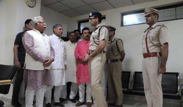 Chief minister Manohar Lal Khattar with the previous commissioner of police, Navdeep Singh Virk, during an inspection of the Cyber Crime Cell in May. (Parveen Kumar/HT Photo) Chief minister Manohar Lal Khattar with the previous commissioner of police, Navdeep Singh Virk, during an inspection of the Cyber Crime Cell in May. (Parveen Kumar/HT Photo)