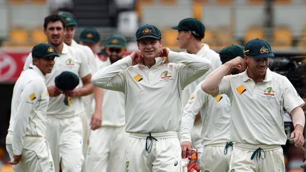Australia's captain Steve Smith (C) adjusts his collar as he walks off the field with teammates after beating Pakistan in the first Test. (AFP) Australia's captain Steve Smith (C) adjusts his collar as he walks off the field with teammates after beating Pakistan in the first Test. (AFP)