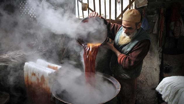 The process involves the mixing and producing of the specific colours needed for the dye, the soaking of fabric in boiling, coloured water and then drying the coloured threads. (Waseem Andrabi/HT Photo)