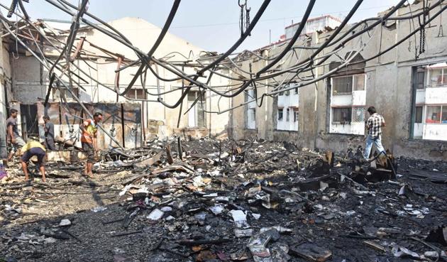 The library was gutted in a fire that broke out at Sydenham College building in Churchgate on Sunday morning.(HT Photo)