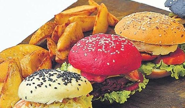 A recent study has found that consumption of burgers, oily and fried food, salted snacks, dry fruits and nuts may be associated with asthma.(HT Photo) A recent study has found that consumption of burgers, oily and fried food, salted snacks, dry fruits and nuts may be associated with asthma.(HT Photo)