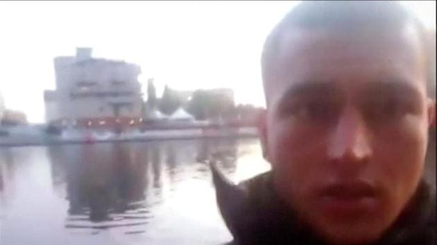 A still image taken from a short 'selfie' video clip from a social media website purportedly shows Anis Amri, the Tunisian suspect of the Berlin Christmas market attack, at an unknown location.(Reuters Photo)