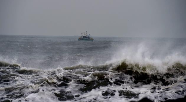 Fishermen return to harbour in Chennai. (PTI Photo) Fishermen return to harbour in Chennai. (PTI Photo)
