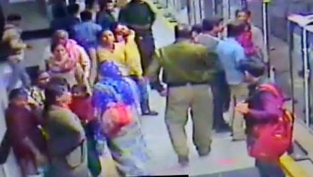 A grab of the CCTV footage shows the walking keeping something in his pocket that one of the women pickpockets had handed him over.(Handout) A grab of the CCTV footage shows the walking keeping something in his pocket that one of the women pickpockets had handed him over.(Handout)