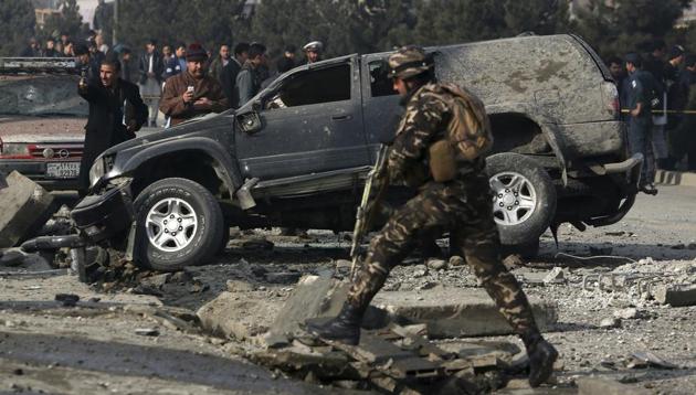 Afghan security personnel inspect at the site of roadside bomb blast in Kabul, Afghanistan. Afghan officials say that at least three people have been wounded by a roadside bomb blast in the capital, Kabul.(AP Photo) Afghan security personnel inspect at the site of roadside bomb blast in Kabul, Afghanistan. Afghan officials say that at least three people have been wounded by a roadside bomb blast in the capital, Kabul.(AP Photo)