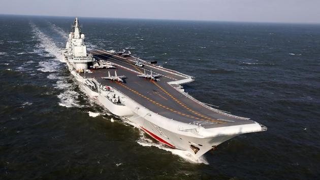This photo shows the Liaoning, China's only aircraft carrier, sailing during military drills in the Pacific.(AFP Photo) This photo shows the Liaoning, China's only aircraft carrier, sailing during military drills in the Pacific.(AFP Photo)