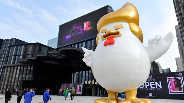 A giant chicken sculpture outside a shopping mall in Taiyuan, north China's Shanxi province. (AFP Photo) A giant chicken sculpture outside a shopping mall in Taiyuan, north China's Shanxi province. (AFP Photo)