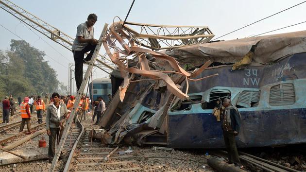 A man cuts an iron frame in front of a damaged coach of a passenger train after it derailed near Kanpur, Uttar Pradesh, on December 28, 2016. (Reuters) A man cuts an iron frame in front of a damaged coach of a passenger train after it derailed near Kanpur, Uttar Pradesh, on December 28, 2016. (Reuters)