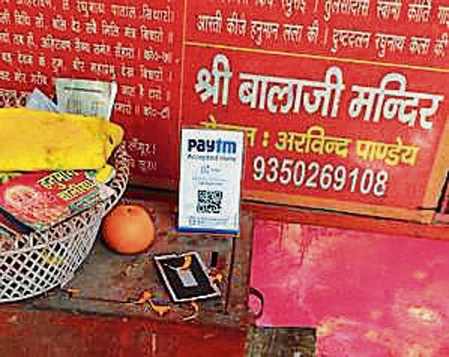 Not being able to collect enough donations due to the cash crisis, temples in Indirapuram have provided the option of e-wallets.