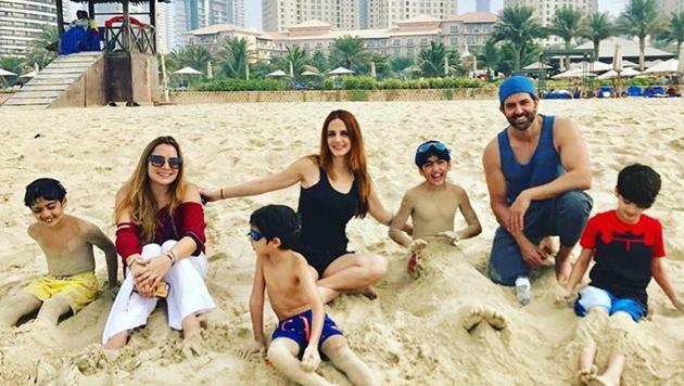 Sussane Khan and Hrithik Roshan spotted at a Dubai beach with their kids.(Instagram/sukr) Sussane Khan and Hrithik Roshan spotted at a Dubai beach with their kids.(Instagram/sukr)