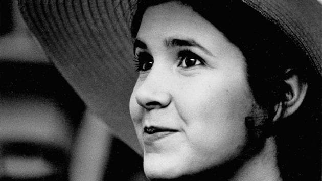 This May 2, 1973 file photo shows Carrie Fisher, the 16-year-old daughter of Debbie Reynolds and Eddie Fisher, in New York. (Jerry Mosey/AP File Photo) This May 2, 1973 file photo shows Carrie Fisher, the 16-year-old daughter of Debbie Reynolds and Eddie Fisher, in New York. (Jerry Mosey/AP File Photo)